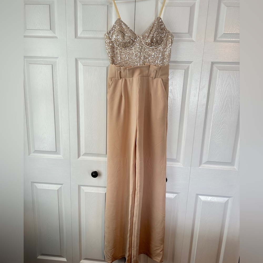 Brand New with tags Fashion Nova sequin top jumpsuit.